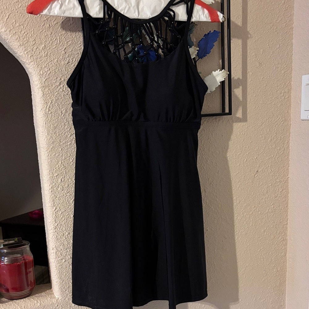Women's Black skirt swimsuit with decorative collar. NWOT
